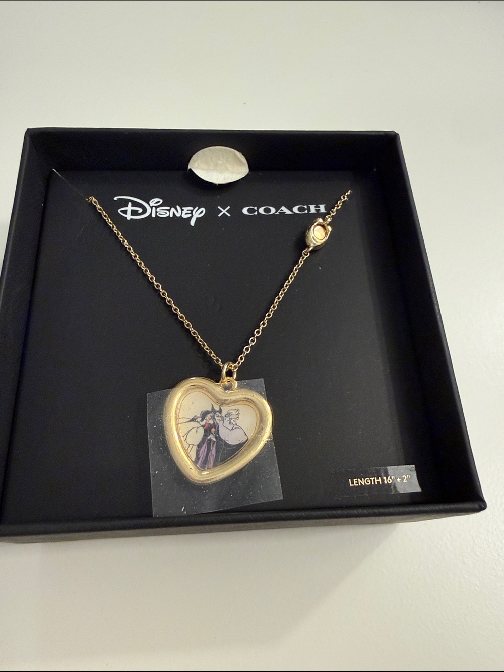 Coach Gold Heart Locket Necklace with Disney Villain Character Artwork